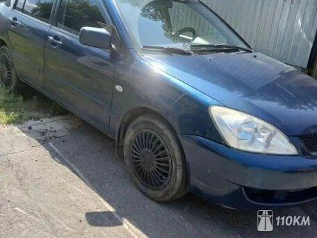 Mitsubishi, Lancer, 1600, 98 / 72 при 5000, бензин, седан, автомат, передний привод, среднее состояние, левый, синий, 270 000 ₽