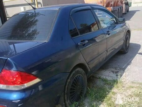 Mitsubishi, Lancer, 1600, 98 / 72 при 5000, бензин, седан, автомат, передний привод, среднее состояние, левый, синий, 270 000 ₽